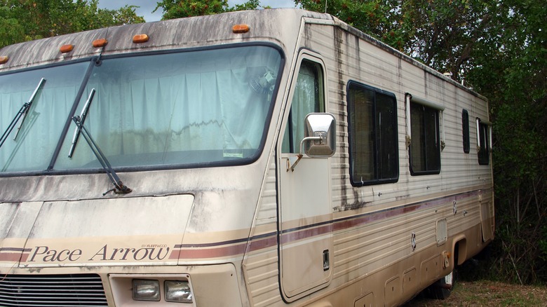 old RV stored in yard