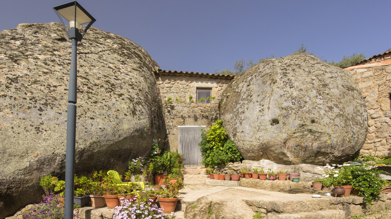 Stone house between two large boulders in Monsanto, Portugal