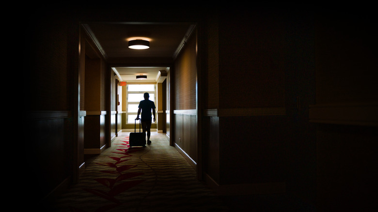 dimly lit hotel hallway