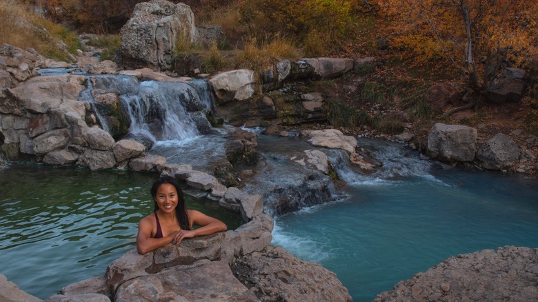 Woman smiling in hot springs