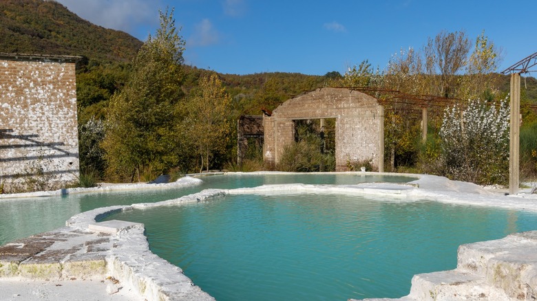 blue thermal pools Tuscan hillside