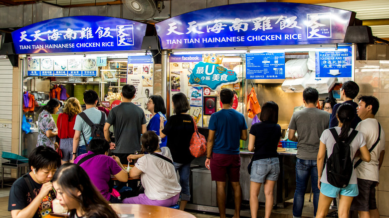 People dining at a hawker center in Singapore