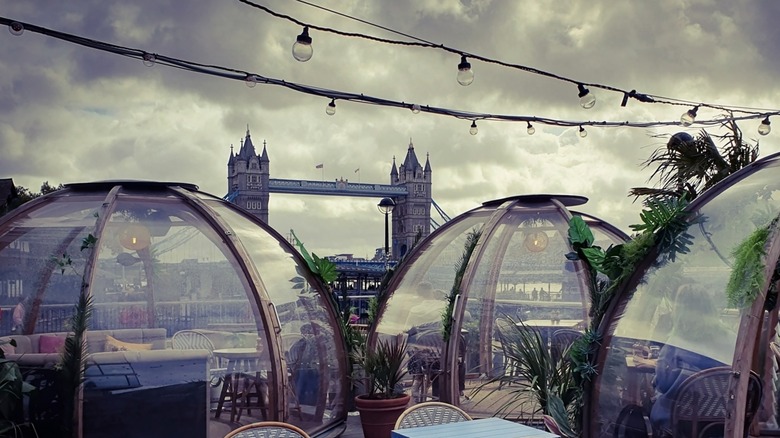 Igloo dining at the Coppa Club in London, with the Tower Bridge in the background