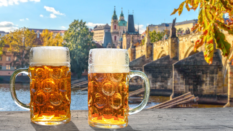 Beer glasses in front of Prague castle