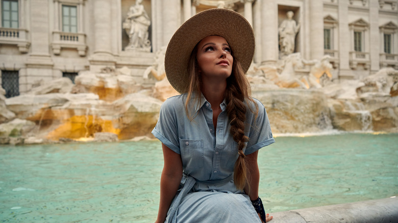 Woman at Rome's Trevi Fountain