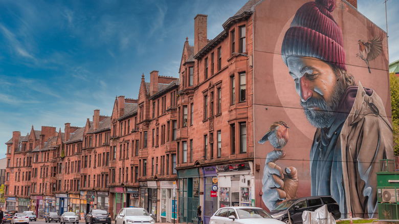 The "Saint Mungo" mural by the artist Smug on a wall in Glasgow, Scotland