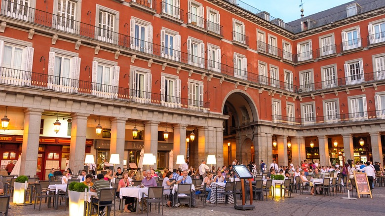 People dining in Madrid at the Plaza Mayor