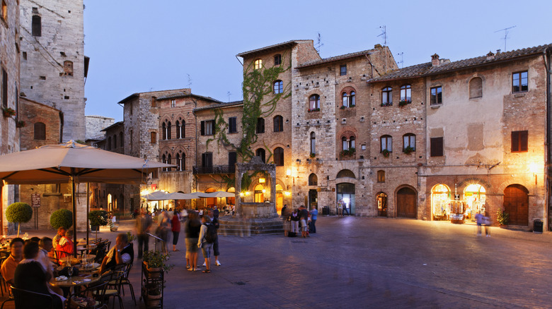 people dining in an Italian piazza