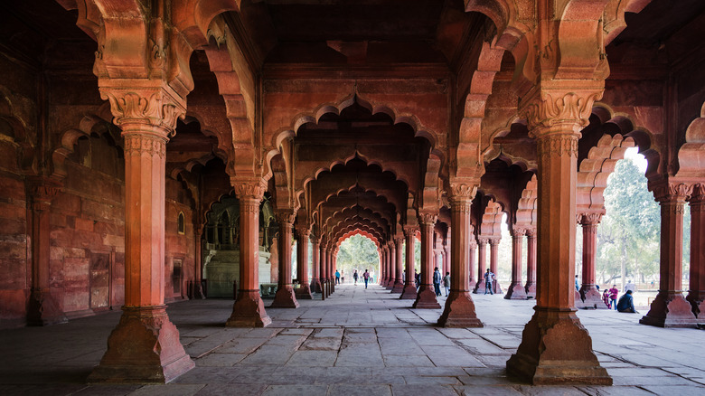 A row of ornate red columns