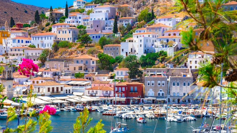 Greek harbor with whitewashed mountain dwellings