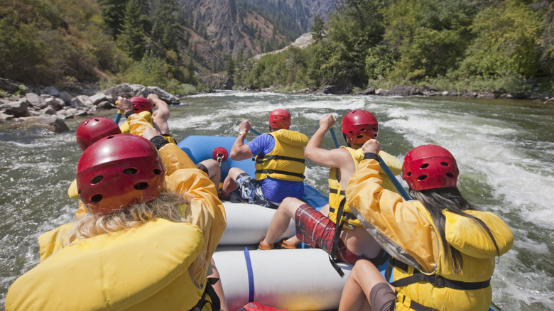 People rafting down the Payette River in Idaho in whitewater rapids