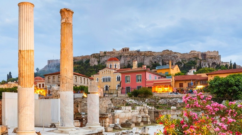 Athenian scene with pillars, flowers and pastel buildings