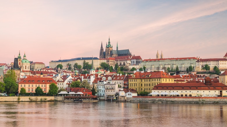 Prague water reflecting pink sky