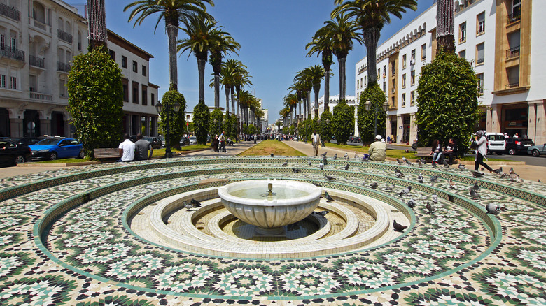 Tiled fountain near palm-lined streets in Rabat, Morocco