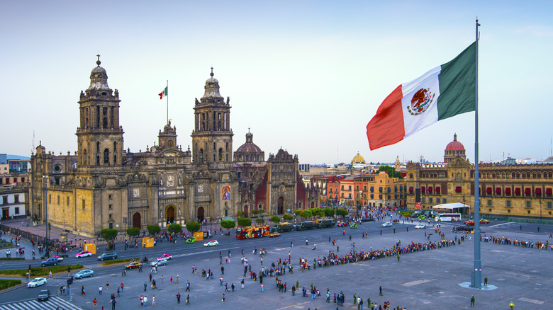 Mexican flag flying over Zocalo, the main square in Mexico City