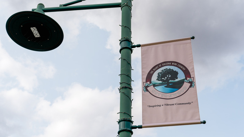 Sign for Cottonwood Wine Country on a cloudy Arizona day