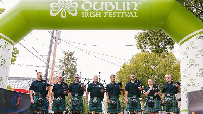 Dublin Irish Festival inflatable sign bagpipe musicans