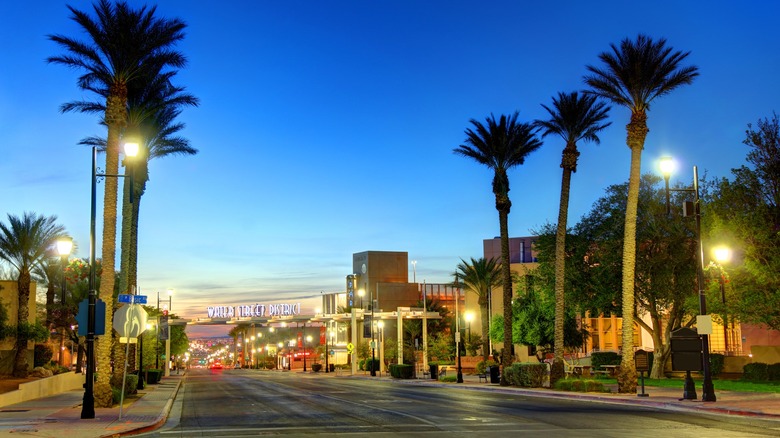 Main road at Water Street District lit at sunset