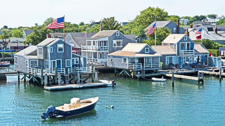 New England houses on stilts in water