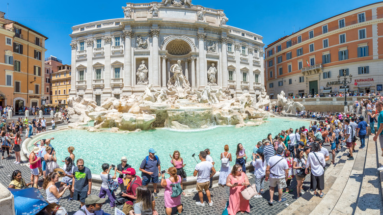 Tourists around the Trevi Fountain