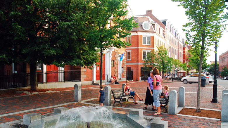 People sitting outside in downtown Portsmouth