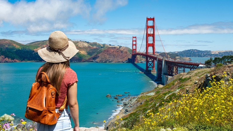 Woman looking at Golden Gate Bridge