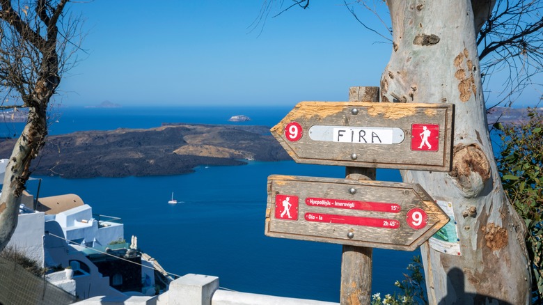 Directional signs on coastal trail