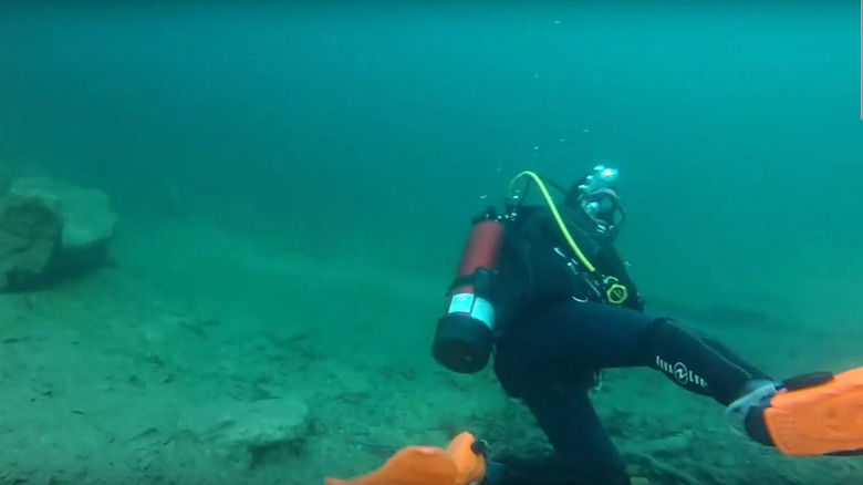 Man diving in White Star Quarry Ohio 