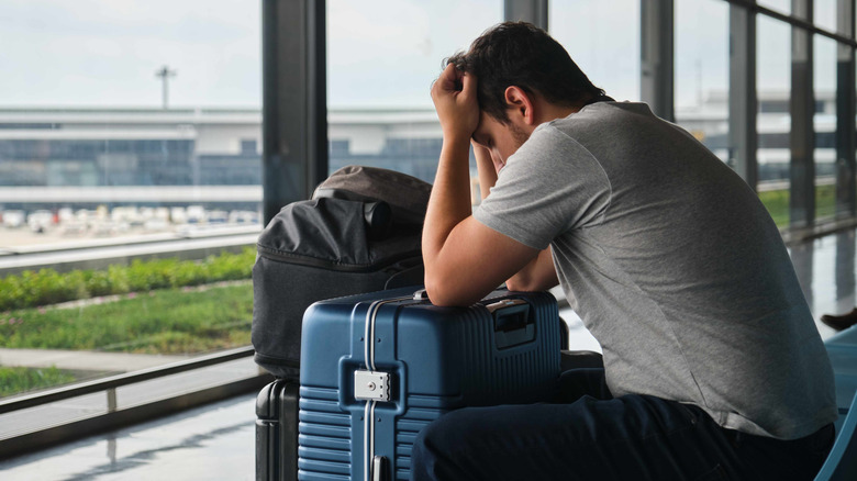 Man arriving late to a flight.