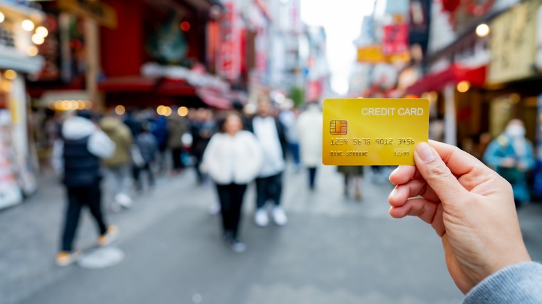 travel credit card crowded street