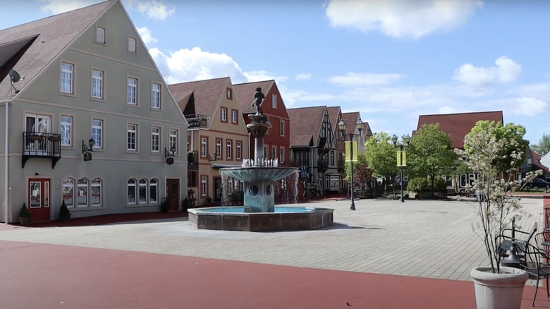 Bavarian buildings behind a fountain in Stoudtburg Village, Pennsylvania