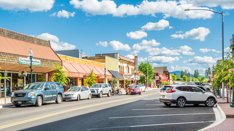 Sandpoint, Idaho's small downtown area with parked cars and storefronts