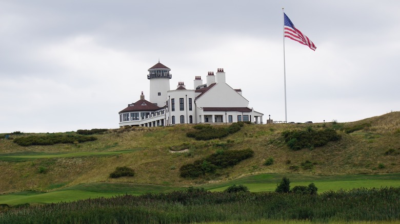 Bayonne Golf Club with greens under overcast sky