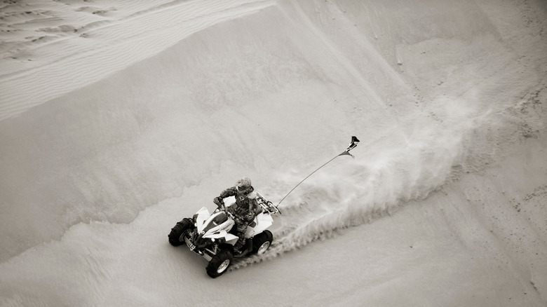 An ATV crusing at St. Anthony Dunes recreation area