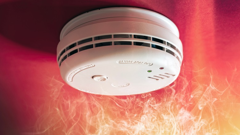 Fire burning around smoke detector