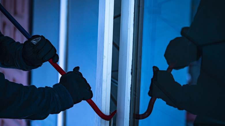 Person breaking into house