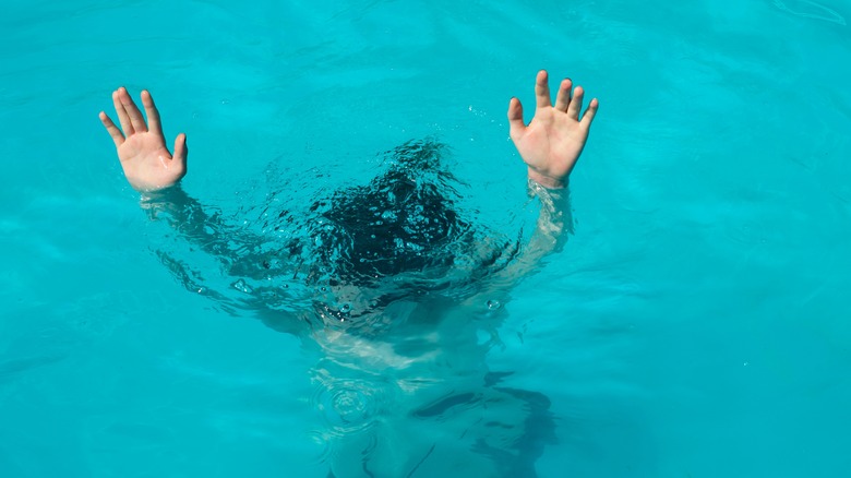 Man drowning in the sea