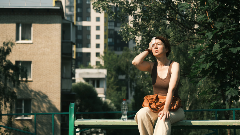 Woman suffering in the heat