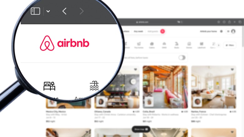A magnifying glass focused on Airbnb