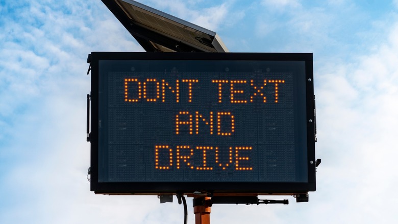 "Don't text and drive" message on sign