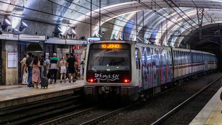 Subway train next to platform in Rome