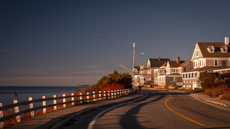 Homes and tranquil seascape at sunset in Cape Cod