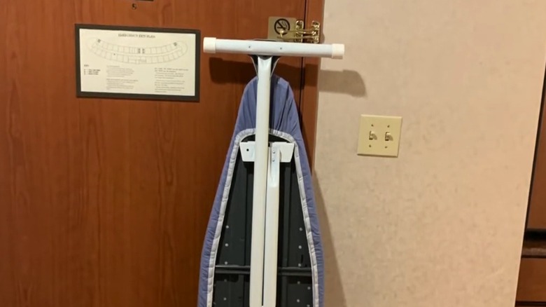 Ironing board by hotel door
