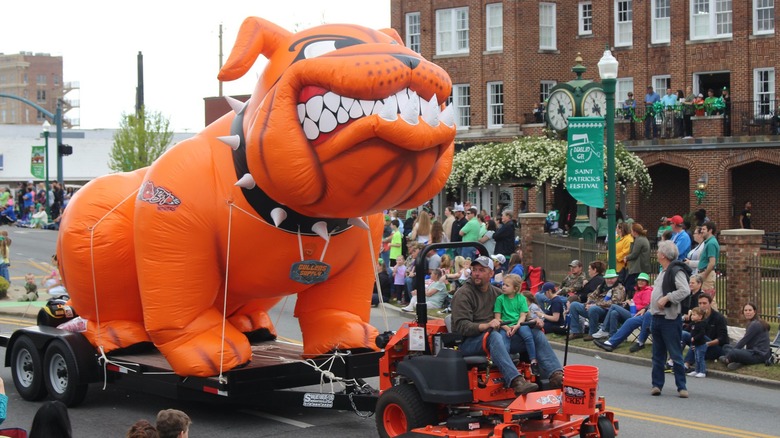 People on a bulldog float during Dublin, Georgia's St. Patrick's Day Parade