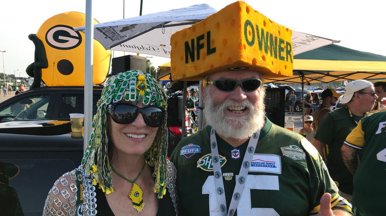 Fans with famous Green Bay Packers Cheesehead hats in Wisconsin