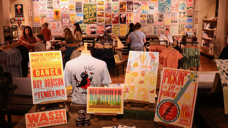 Hatch Show Print gift shop, featuring posters and people shopping