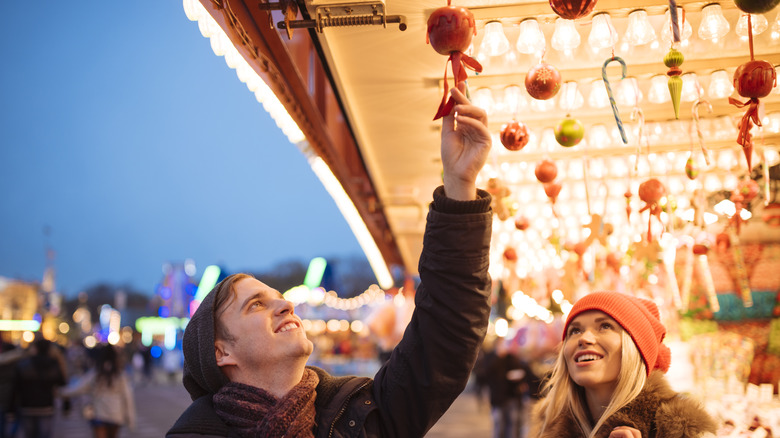 Couple browsing at a Christmas market