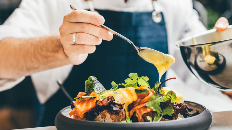 Pro chef serving up a salad