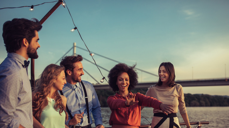 Friends enjoying an evening on a cruise