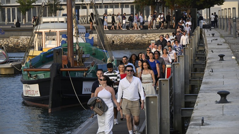 Queue of people near cruise ship in Lisbon